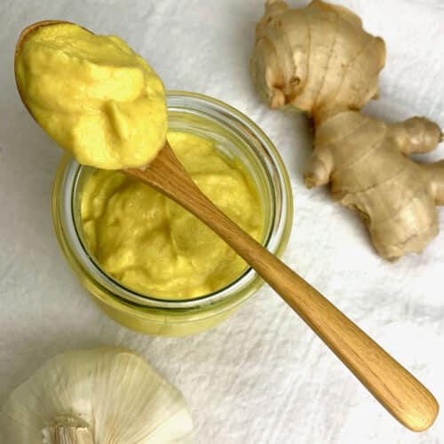 Ginger and garlic paste blended to a smooth paste stored in a glass jar.