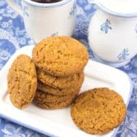 Cardamom Spice Cookies (Indian-ish) Browned, crackly cookies stacked beside a lovely cup of tea.