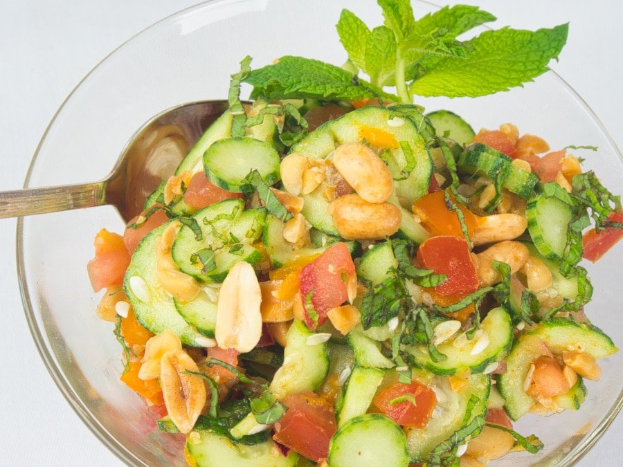 Indian Cucumber Salad (Kachumber) This colorful salad of cucumber and tomato is erved with a sprinkling of peanuts and chopped cilantro.