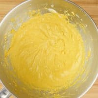 Cardamom Pumpkin Cheesecake (No-Bake) pumpkin batter with all the spicing in mixing bowl