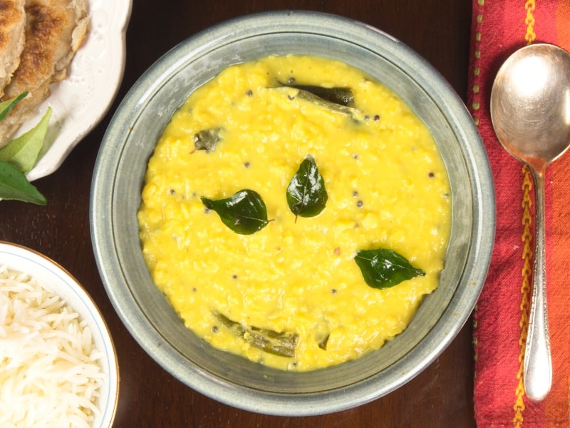 Coconut Lentil Curry(Kerala Parippu) Served up with fried curry leaves and some rice.