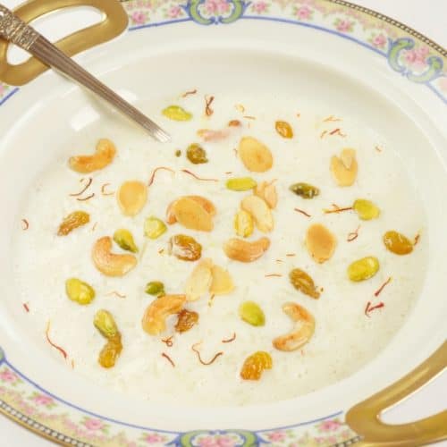 Indian Rice Pudding (Kerala Payasam) Beautifully garnised with nuts, raisins and saffron and ready to serve.