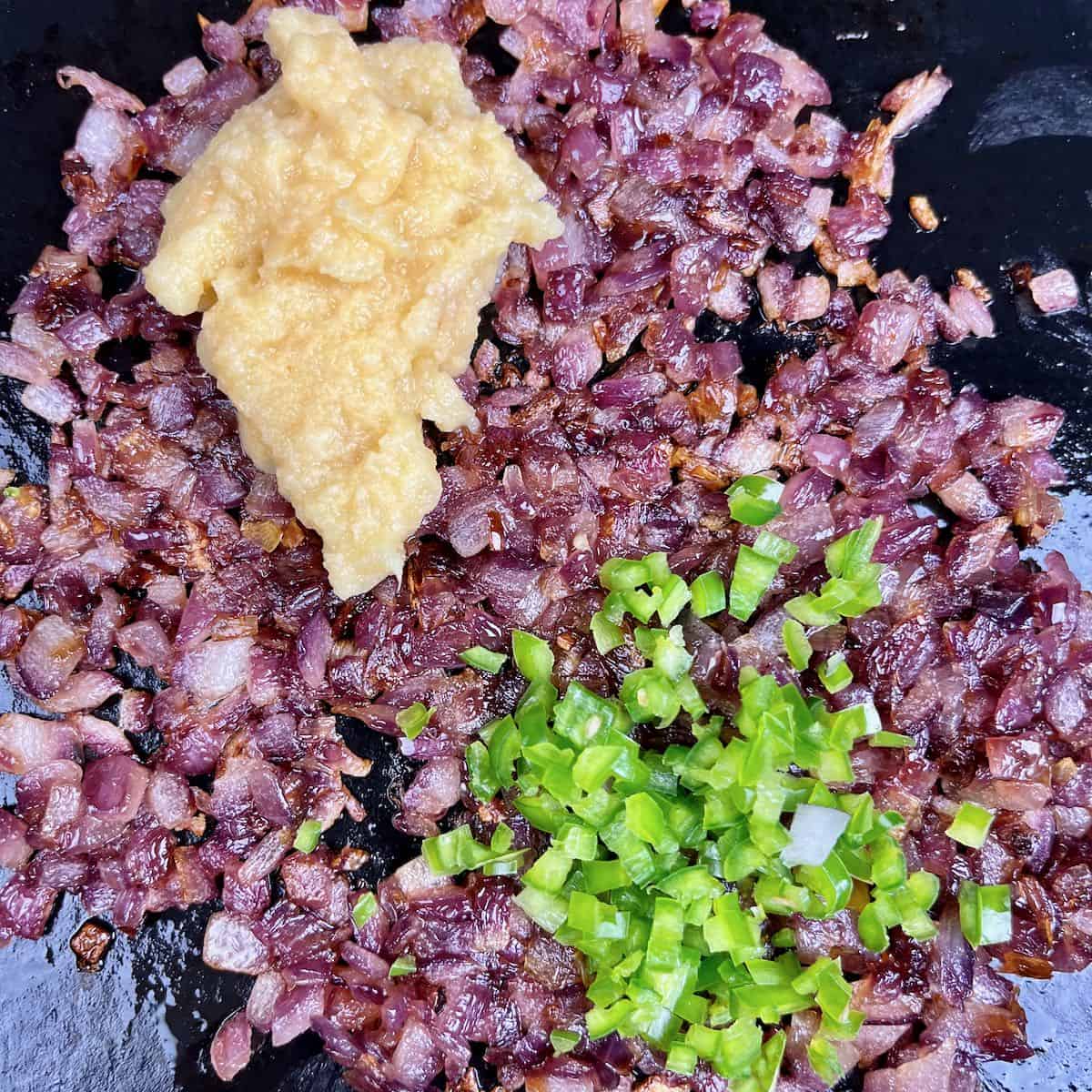 Ginger garlic pasted and minced green chiles add to the browned onions for Beef Keema Curry
