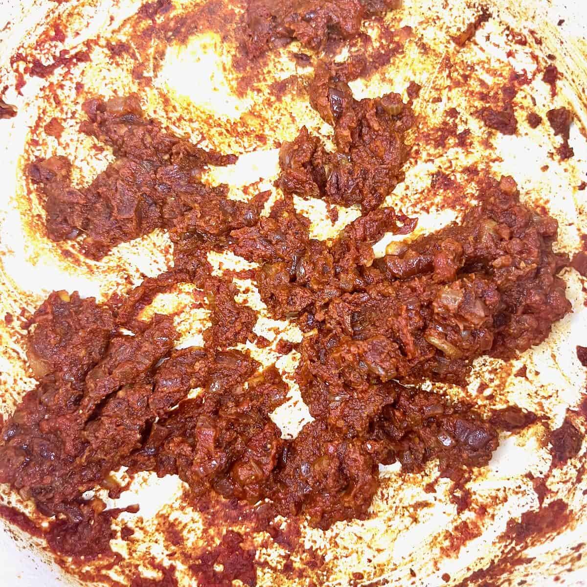 Madras chicken curry aromatics and spices cooked to a thick paste