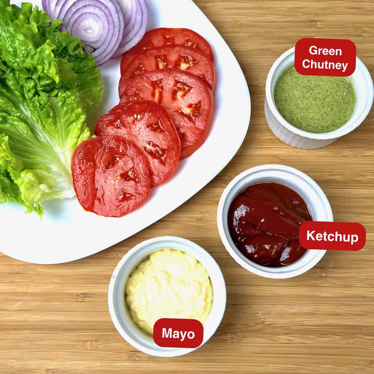 Air Fryer Turkey Burger garnish ideas: tomato, lettuce, onion, mayo, ketchup, and green chutney