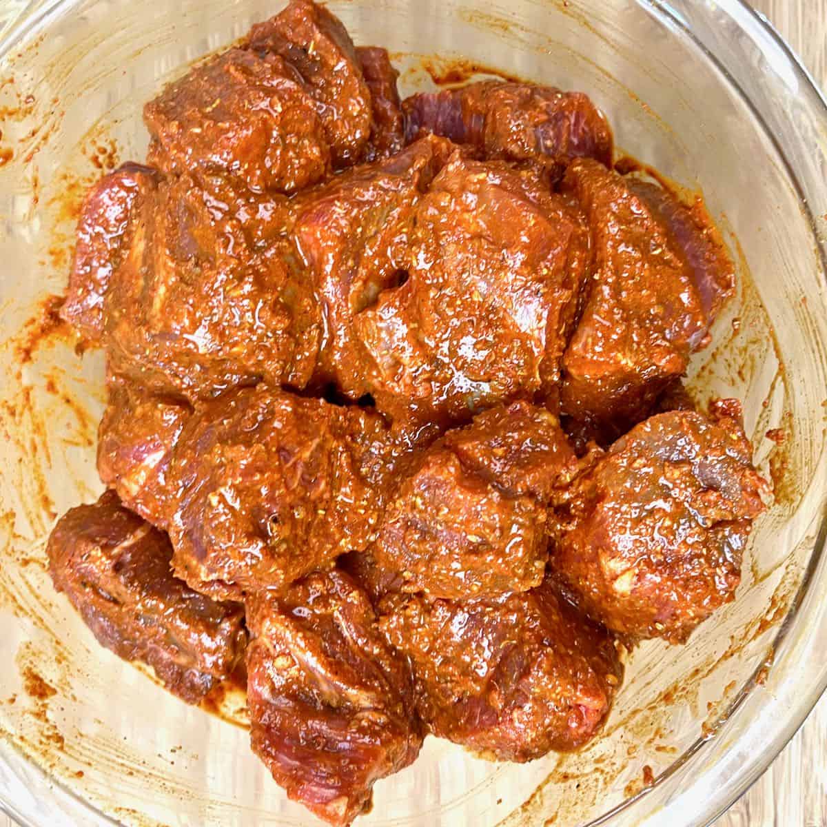 Lamb vindaloo meat coated with the marinade