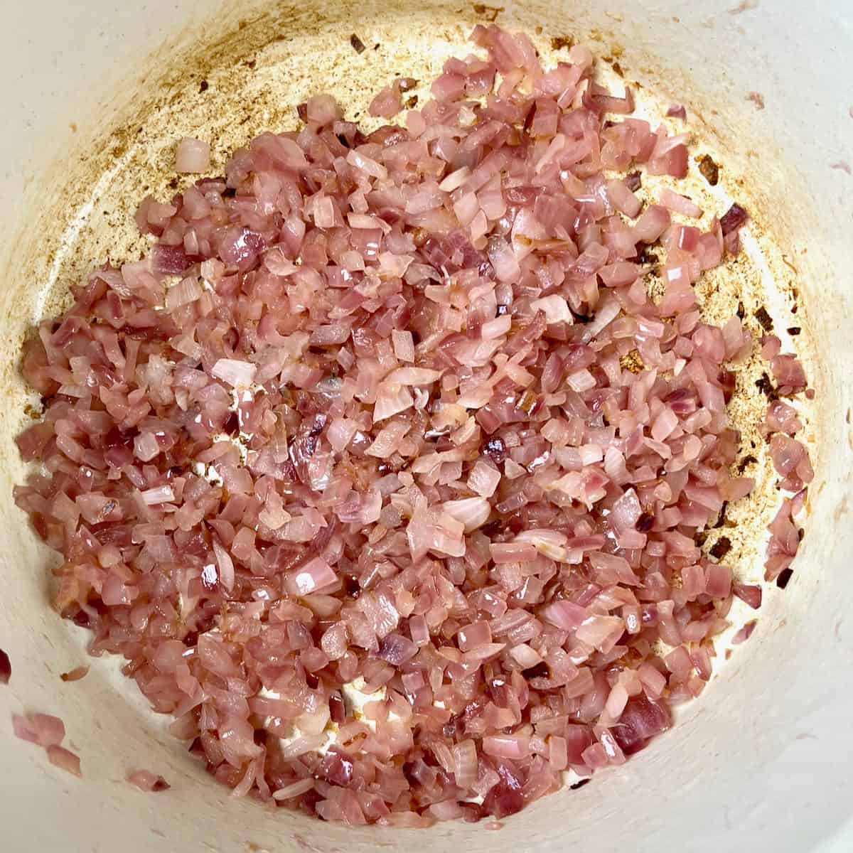 Lamb vindaloo golden brown onions to begin the sauce